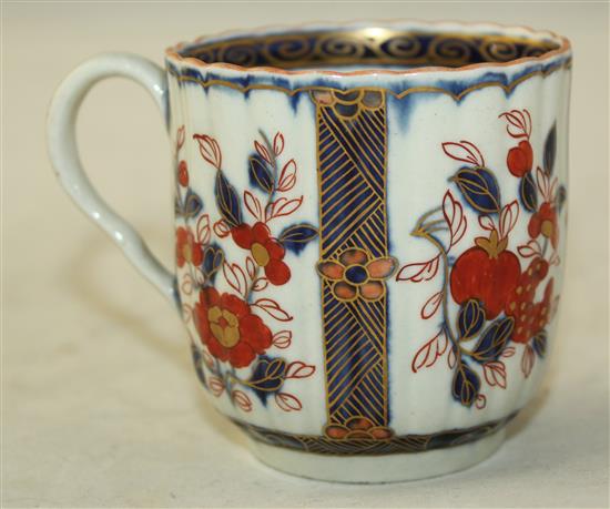 Two Worcester polychrome coffee cups and saucers, c.1775, cup height 7.5cm